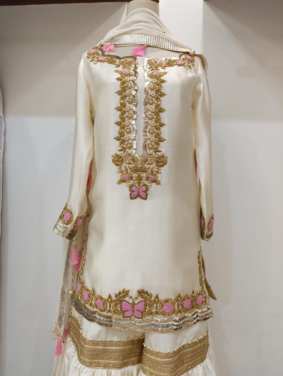 Ivory formal kurta and gharara with pink and gold embroidery