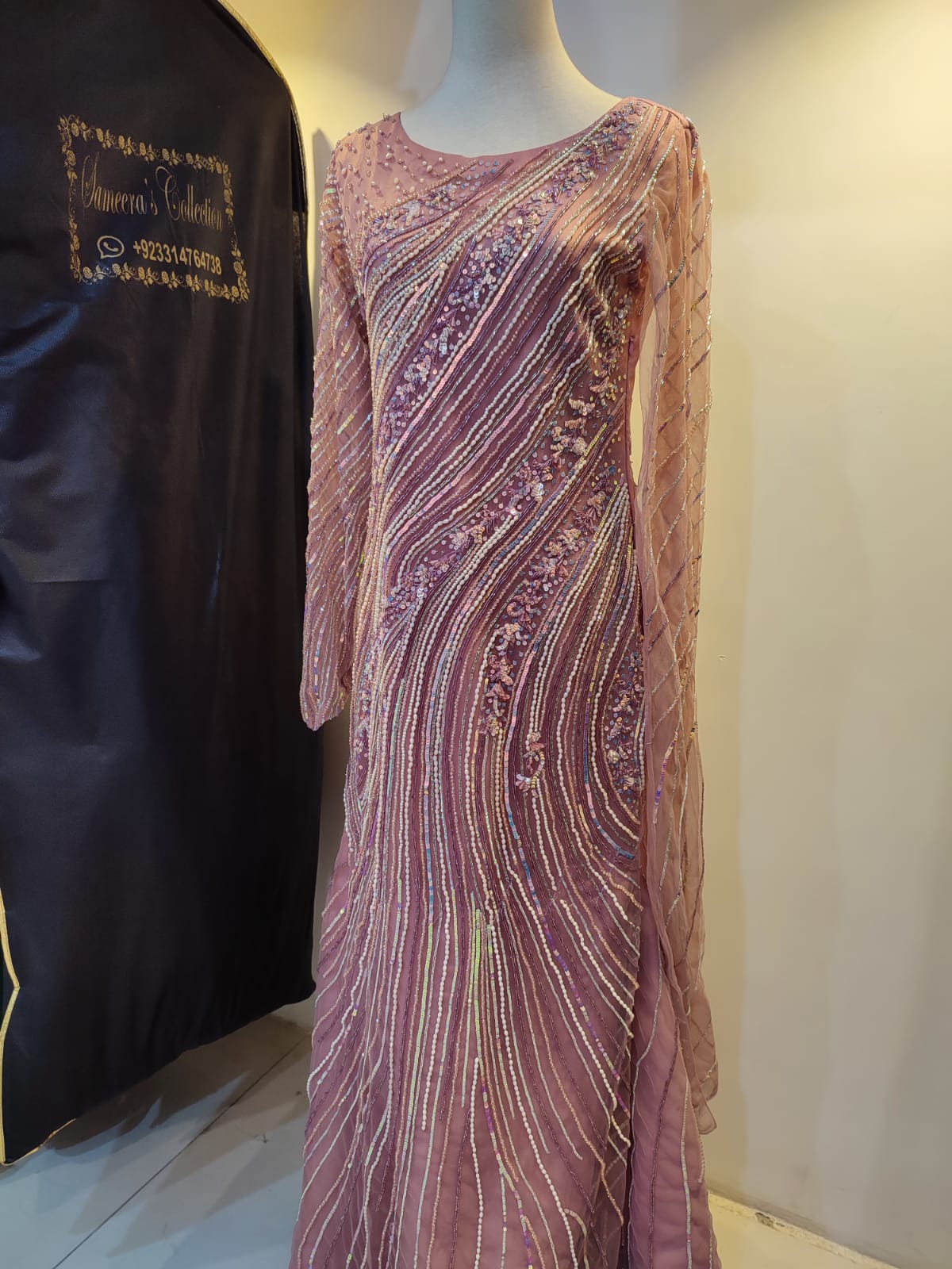 Dusty mauve evening gown with diagonal sequin and bead embellishment